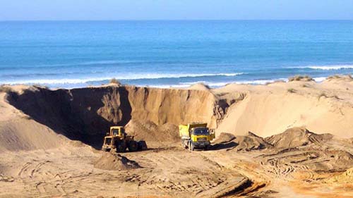 Beach sand is being mined illegally on Morocco's north coast, near Tangier.
